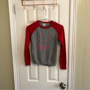 Grey and red smiley face sweater shirt